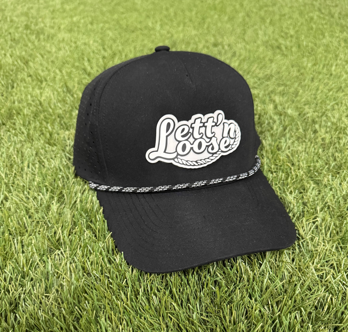 Black "Lett'n Loose" PVC Patch Hat